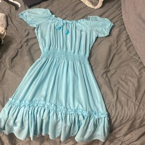 I am selling a sky blue dress that’s very good for simple events.